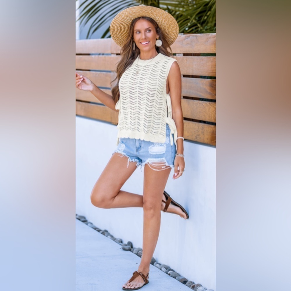Quiet vibes Crème knit Sleeveless side tie top. Size Medium. NWT